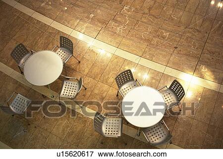Stock Photo - Table and Chair in Caféé, High Angle View. Fotosearch