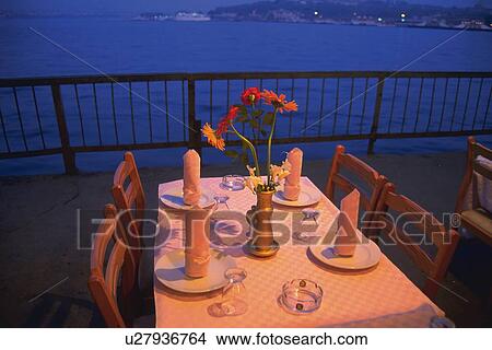 Picture - Table Set by the Sea, High Angle View. Fotosearch