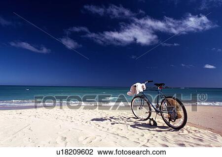 Stock Image - A Bicycle on the Sandy Beach, Side View. Fotosearch