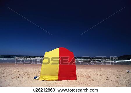 Stock Image - A Tent on the Sandy Beach. Fotosearch