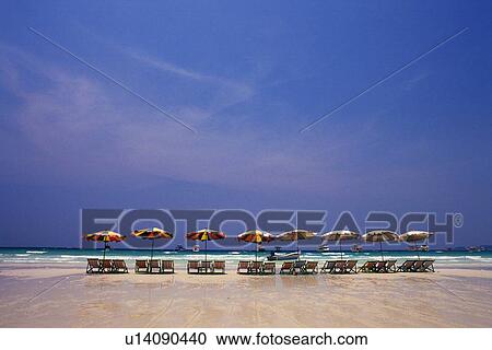 Beach Umbrellas and Chairs at the Beach View Large Photo Image Stock Image - Beach Umbrellas and Chairs at the Beach. Fotosearch