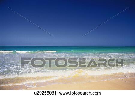 Stock Image - Blue Sky and the Beach of North Shore, Hawaii, Pan Focus. Fotosearch