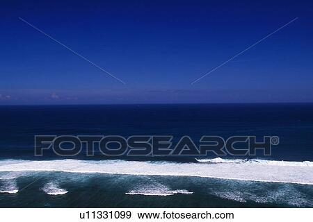 Stock Photo - Blue Sky and the Ocean, High Angle View. Fotosearch