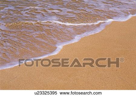 Closed Up Image of Gentle Waves Lapping at the Sandy Beach, High Angle View View Large Photo Image Stock Photography - Closed Up Image of Gentle Waves Lapping at the Sandy Beach, High Angle View. Fotosearch
