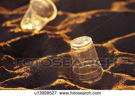Closed Up Image of Plastic Cups on the Sandy Beach, High Angle View, Differential Focus View Large Photo Image Stock Photo - Closed Up Image of Plastic Cups on the Sandy Beach, High Angle View, Differential Focus. Fotosearch