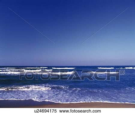 Stock Photography - The Beach and the Blue Sky, Pan Focus. Fotosearch