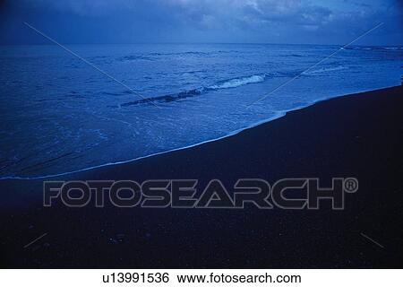 Stock Photograph - The Beach in the Dusk, Pan Focus. Fotosearch