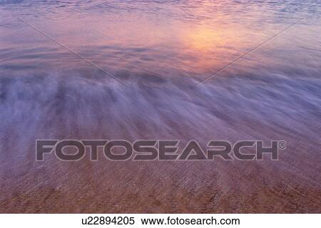 Waves Lapping at the Beach, Long Exposure View Large Photo Image Stock Photography - Waves Lapping at the Beach, Long Exposure. Fotosearch