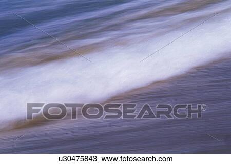 White Waves Lapping at the Beach, Blurred Motion View Large Photo Image Stock Image - White Waves Lapping at the Beach, Blurred Motion. Fotosearch