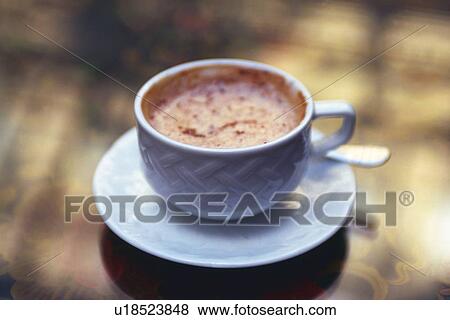 Stock Photo - Closed Up Image of a Cup of Cappuccino, High Angle View, Differential Focus, Paris, France. Fotosearch