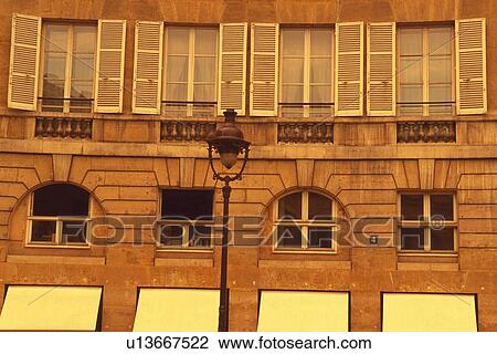 Closed Up Image of a Parisian Apartment house Made of Stones, Low Angle View, Front View, Paris, France View Large Photo Image Stock Image - Closed Up Image of a Parisian Apartment house Made of Stones, Low Angle View, Front View, Paris, France. Fotosearch