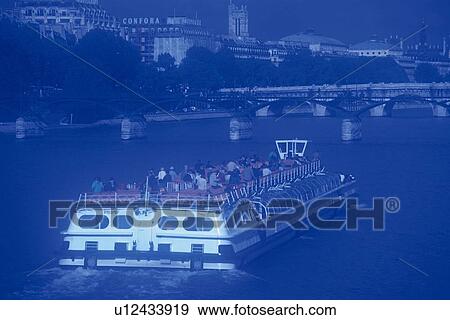 Stock Photo - Image of a Huge Tourist Ship on the Seine River, High Angle View, Soft Focus, Paris, France. Fotosearch