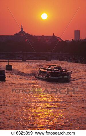 Stock Photo - Image of Several Boats on the Seine By Sunset, High Angle View, Paris, France. Fotosearch