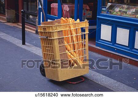 Image of Some French Bread in a Yellow-colored Basket, Side View, Paris, France View Large Photo Image Stock Image - Image of Some French Bread in a Yellow-colored Basket, Side View, Paris, France. Fotosearch