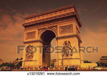 Stock Image - Image of the Arc de Triomphe By Sunset, Low Angle View, Paris, France. Fotosearch