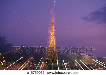 Stock Photograph - Image of the Eiffel Tower By in the Evening, Illuminated, Front View, Long Exposure, Paris, France. Fotosearch