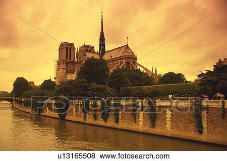 Image of the Notre Dame and the Seine Next to It By Sunset, Low Angle View, Side View, Paris, France View Large Photo Image Stock Photo - Image of the Notre Dame and the Seine Next to It By Sunset, Low Angle View, Side View, Paris, France. Fotosearch