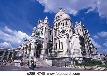 Image of the Sacre-Coeur Under a Blue Sky on a Sunny Day, Low Angle View, Paris, France View Large Photo Image Stock Image - Image of the Sacre-Coeur Under a Blue Sky on a Sunny Day, Low Angle View, Paris, France. Fotosearch