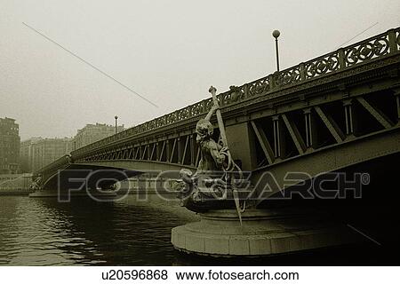 Image of a Bridge Spreading Over the Seine, a Statue In Front of it, Side View, Low Angle View, Paris, France View Large Photo Image Stock Photo - Image of a Bridge Spreading Over the Seine, a Statue In Front of it, Side View, Low Angle View, Paris, France. Fotosearch