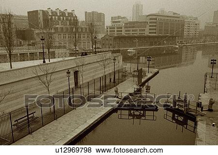 Stock Photo - Image of a Huge Lake Next to Some Apartment Houses, High Angle View, Paris, France. Fotosearch