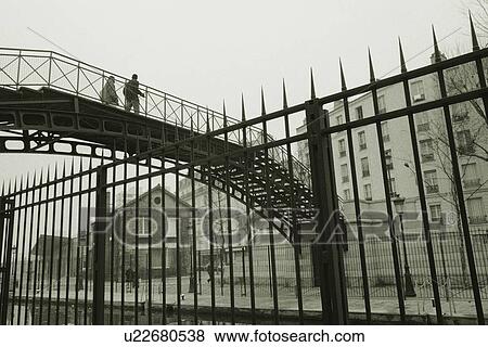 Image of a Little Bridge Near a Black-colored Fence, Low Angle View, Side View, Paris, France View Large Photo Image Stock Photo - Image of a Little Bridge Near a Black-colored Fence, Low Angle View, Side View, Paris, France. Fotosearch