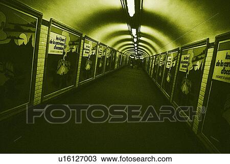 Image of a Long Hallway With a Large Group of Poster Hanging on the Wall, Front View, Paris, France View Large Photo Image Stock Image - Image of a Long Hallway With a Large Group of Poster Hanging on the Wall, Front View, Paris, France. Fotosearch