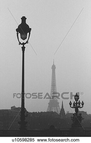Stock Photography - Image of a Street Lamp and the Eiffel Tower in the Background, Front View, Paris, France. Fotosearch