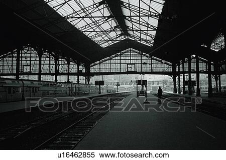 Image of a Train Station in Paris, a Single Person Waiting For a Train, Front View, Side View, Paris, France View Large Photo Image Stock Photography - Image of a Train Station in Paris, a Single Person Waiting For a Train, Front View, Side View, Paris, France. Fotosearch