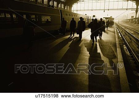 Stock Photo - Image of Several Passengers at a Station in Paris, About to Get On the Train, Side View, Paris, France. Fotosearch