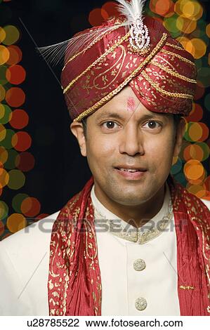 Portrait of a groom in a traditional wedding outfit View Large Photo Image Stock Image - Portrait of a groom in a traditional wedding outfit. Fotosearch