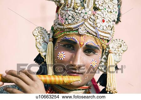 Portrait of a performer holding a flute, Elephant Festival, Jaipur, Rajasthan, India View Large Photo Image Picture - Portrait of a performer holding a flute, Elephant Festival, Jaipur, Rajasthan, India. Fotosearch