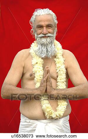 Portrait of a priest greeting View Large Photo Image Stock Image - Portrait of a priest greeting. Fotosearch
