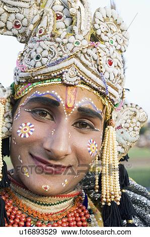 Stock Photo - Portrait of male performer smiling at an elephant festival, Jaipur, Rajasthan, India. Fotosearch