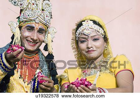 Portrait of two performers holding rose petals, Elephant Festival, Jaipur, Rajasthan, India View Large Photo Image Stock Photo - Portrait of two performers holding rose petals, Elephant Festival, Jaipur, Rajasthan, India. Fotosearch