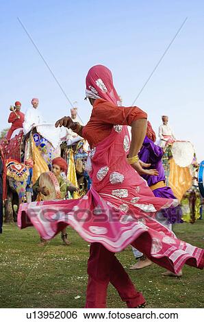 Side profile of a female performer dancing, Elephant Festival, Jaipur, Rajasthan, India View Large Photo Image Stock Photograph - Side profile of a female performer dancing, Elephant Festival, Jaipur, Rajasthan, India. Fotosearch