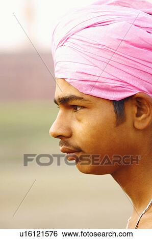 Side profile of a young man View Large Photo Image Stock Photograph - Side profile of a young man. Fotosearch