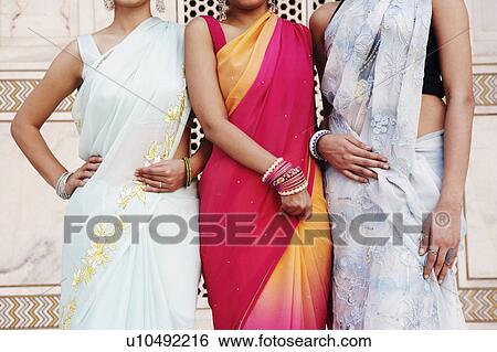 Close-up of three young women standing in a mausoleum, Taj Mahal, Agra, Uttar Pradesh, India View Large Photo Image Stock Photograph - Close-up of three young women standing in a mausoleum, Taj Mahal, Agra, Uttar Pradesh, India. Fotosearch