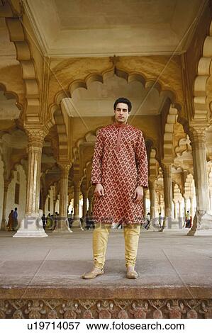 Portrait of a young man standing, Agra Fort, Agra, Uttar Pradesh, India View Large Photo Image Stock Photo - Portrait of a young man standing, Agra Fort, Agra, Uttar Pradesh, India. Fotosearch