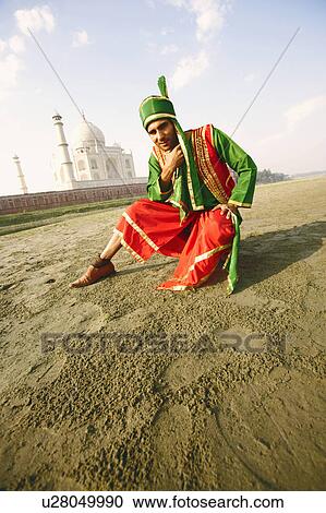 Portrait of a young man thinking with his hand on his chin, Taj Mahal, Agra, Uttar Pradesh, India View Large Photo Image Stock Image - Portrait of a young man thinking with his hand on his chin, Taj Mahal, Agra, Uttar Pradesh, India. Fotosearch