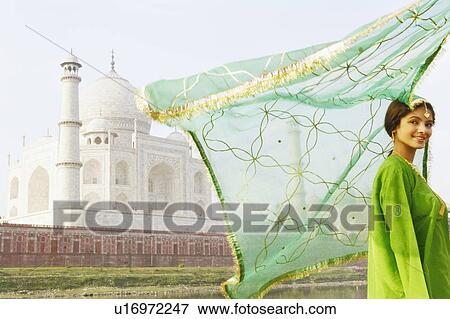 Side profile of a young woman smiling, Taj Mahal, Agra, Uttar Pradesh, India View Large Photo Image Stock Photo - Side profile of a young woman smiling, Taj Mahal, Agra, Uttar Pradesh, India. Fotosearch