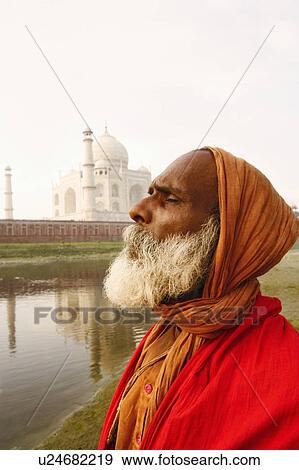 Close-up of a priest meditating on the riverbank with his eyes closed, Taj Mahal, Agra, Uttar Pradesh, India View Large Photo Image Stock Photo - Close-up of a priest meditating on the riverbank with his eyes closed, Taj Mahal, Agra, Uttar Pradesh, India. Fotosearch