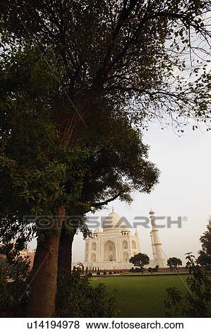 Stock Photo - Garden in front of a mausoleum, Taj Mahal, Agra, Uttar Pradesh, India. Fotosearch