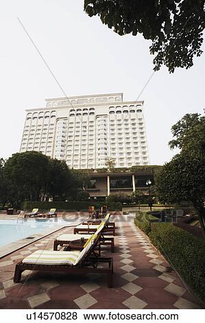 Stock Photo - Low angle view of a multi-storied building. Fotosearch