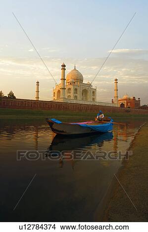 Person sitting in a boat, Taj Mahal, Agra, Uttar Pradesh, India View Large Photo Image Picture - Person sitting in a boat, Taj Mahal, Agra, Uttar Pradesh, India. Fotosearch