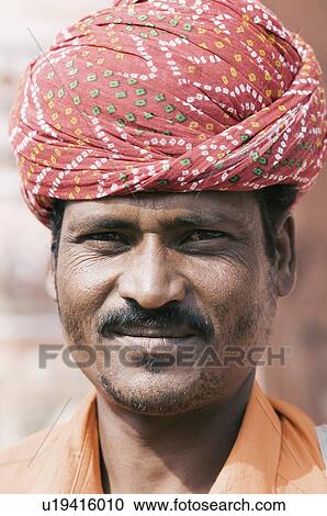 Portrait of a mid adult man in front of a palace, Hawa Mahal, Jaipur, Rajasthan, India View Large Photo Image Stock Image - Portrait of a mid adult man in front of a palace, Hawa Mahal, Jaipur, Rajasthan, India. Fotosearch
