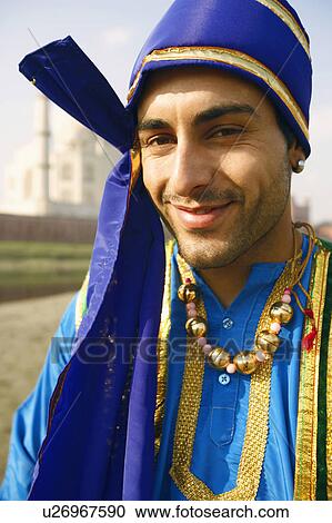 Portrait of a young man standing on the riverbank, Taj Mahal, Agra, Uttar Pradesh, India View Large Photo Image Stock Image - Portrait of a young man standing on the riverbank, Taj Mahal, Agra, Uttar Pradesh, India. Fotosearch