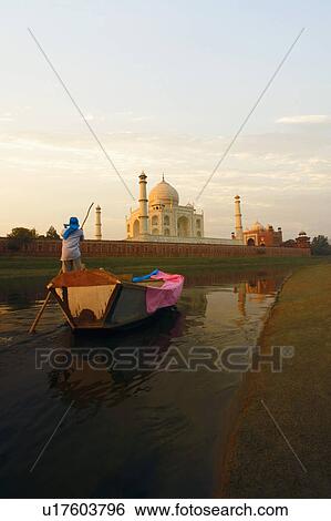Rear view of a man rowing a boat, Taj Mahal, Agra, Uttar Pradesh, India View Large Photo Image Stock Photograph - Rear view of a man rowing a boat, Taj Mahal, Agra, Uttar Pradesh, India. Fotosearch