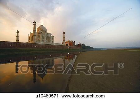 Reflection of a mausoleum in water, Taj Mahal, Agra, Uttar Pradesh, India View Large Photo Image Stock Image - Reflection of a mausoleum in water, Taj Mahal, Agra, Uttar Pradesh, India. Fotosearch