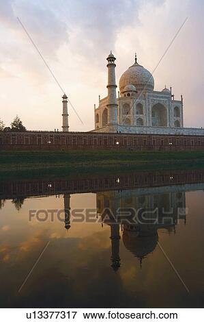 Stock Photo - Reflection of a mausoleum in water, Taj Mahal, Agra, Uttar Pradesh, India. Fotosearch