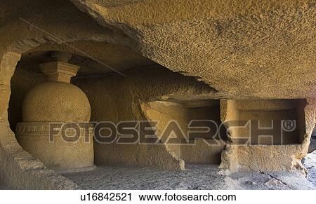 Stock Image - Close-up of a sculpture in a cave, Kanari Cave, Mumbai, Maharashtra, India. Fotosearch